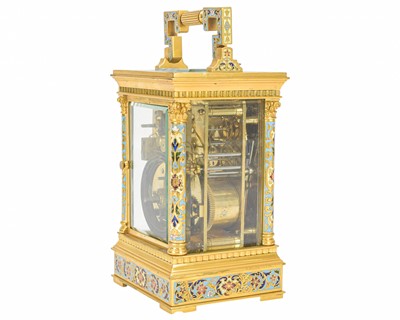 Lot 770 - A French champleve enamel grande sonnerie repeating carriage alarm clock.