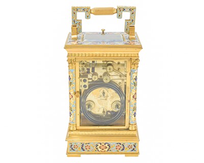 Lot 770 - A French champleve enamel grande sonnerie repeating carriage alarm clock.