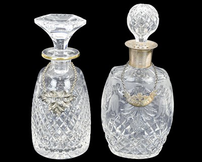 Lot 529 - A cut glass silver mounted decanter and stopper.
