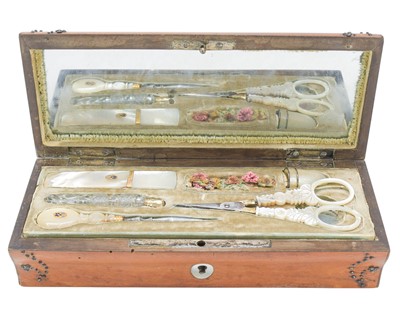 Lot 1 - A French Palais Royale satinwood cased necessaire.