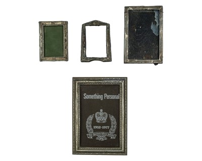 Lot 263 - A set of four silver mounted picture frames.