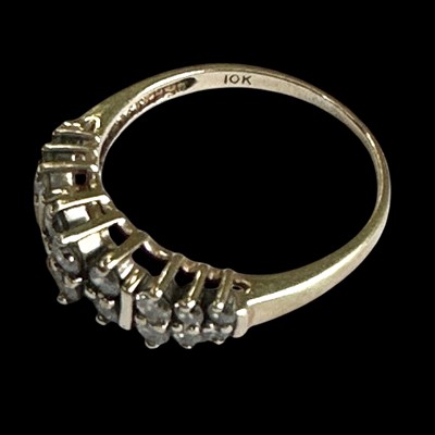 Lot 200 - A 10k gold and diamond chip ring, size T.