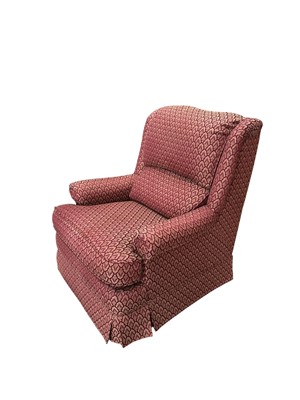 Lot 201 - A comfortable armchair with patterned...