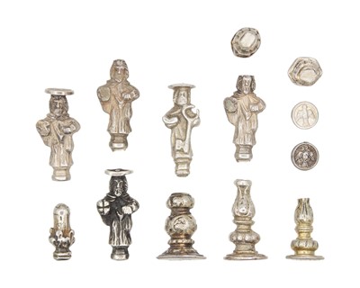 Lot 220 - A selection of silver cutlery finials.