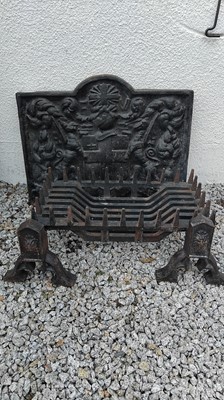 Lot 66 - A heavy cast iron fireback in 17th century style.
