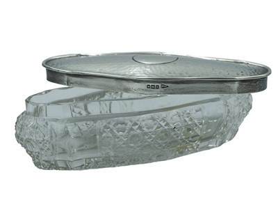 Lot 251 - A George V cut glass and silver-lidded cosmetic jar by Walker & Hall.