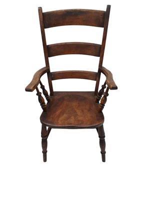 Lot 695 - A bar back kitchen Windsor armchair.