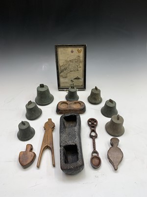 Lot 107 - Seven assorted bronze hand bells, variously...