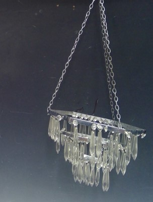 Lot 244 - A Vintage Glass and Chrome Chandelier. The...