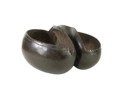 Lot 33 - A carved Coco de Mer (Lodoicea maldivica) carved open basket/hanging.