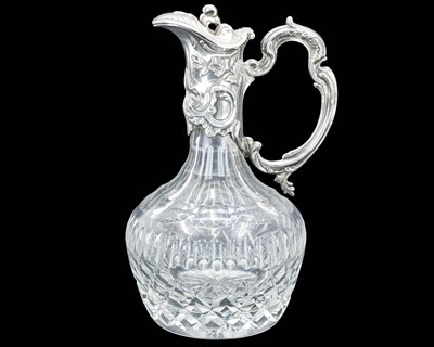 Lot 522 - A cut glass claret jug.