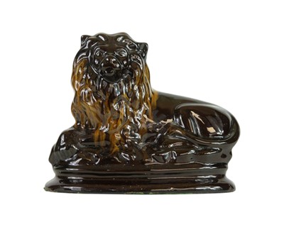 Lot 81 - A heavy vitreous enamel lion doorstop.