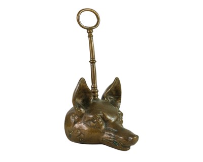 Lot 736 - A Victorian fox mask heavy brass doorstop.