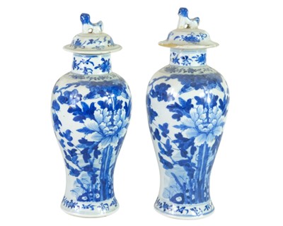 Lot 383 - Two similar Chinese blue and white porcelain vases and covers