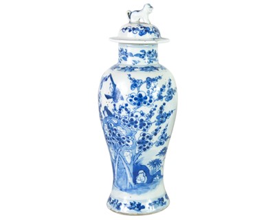 Lot 311 - A Chinese blue and white porcelain vase and cover.