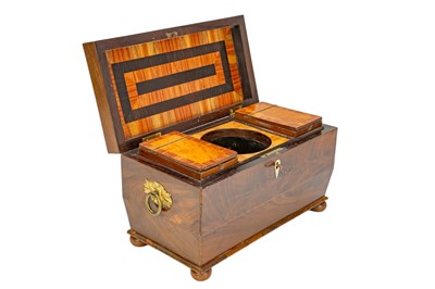 Lot 176 - A George III mahogany sarcophagus form tea caddy.