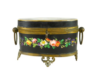 Lot 548 - A French porcelain and gilt metal oval porcelain toilet casket.