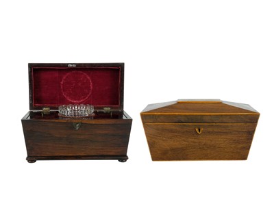 Lot 180 - A rosewood tea caddy of sarcophagus form.