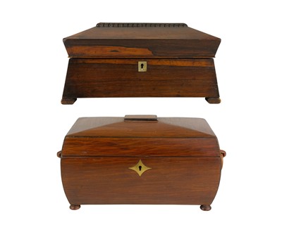 Lot 182 - A partridge wood tea caddy of sarcophagus form.