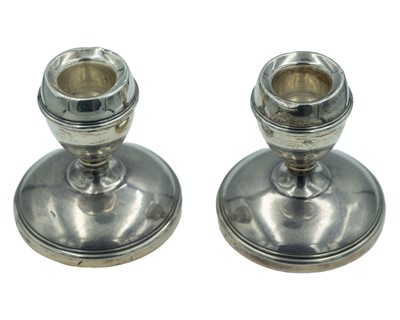 Lot 376 - A pair of silver squat candlesticks by J. B. Chatterley & Sons Ltd.