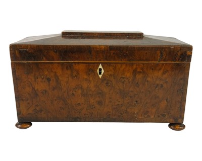 Lot 682 - A George III burr yew wood tea caddy.