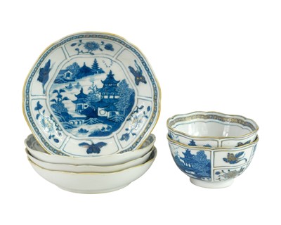 Lot 371 - A pair of Chinese blue and white porcelain rice bowls and stands.