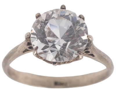 Lot 398 - A white metal and white gemstone ring.