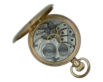 Lot 542 - BUREN - A gold-plated full-hunter keyless wind pocket watch.