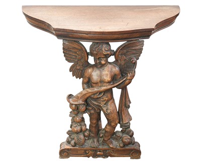 Lot 702 - A carved walnut console table.