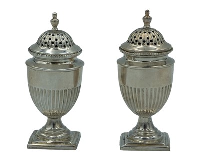 Lot 199 - A pair of Victorian silver pepperettes by David & Lionel Spiers.