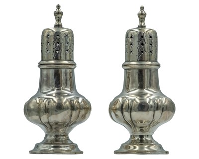 Lot 337 - A pair of Victorian silver pepperettes.