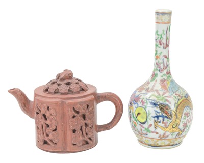 Lot 318 - A Chinese Yixing teapot and cover.