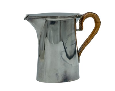 Lot 226 - An Arts and Crafts silver milk jug.