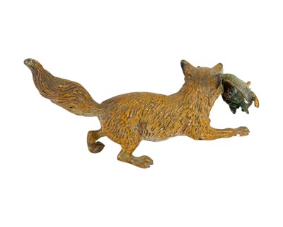 Lot 46 - An Austrian cold painted bronze figure of a fox with a duck.