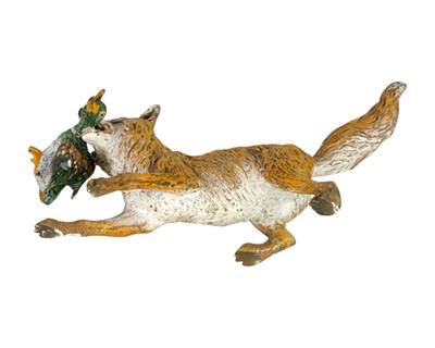 Lot 46 - An Austrian cold painted bronze figure of a fox with a duck.