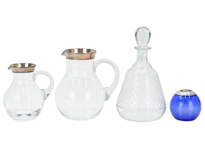 Lot 588 - A blue glass match striker with silver rim.
