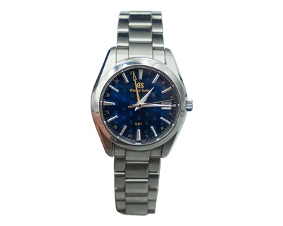 Lot 636 - GRAND SEIKO - A Heritage GMT Quartz Watch 50th Anniversary stainless steel gentleman's bracelet wristwatch.