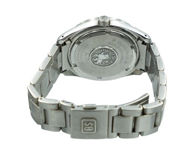 Lot 636 - GRAND SEIKO - A Heritage GMT Quartz Watch 50th Anniversary stainless steel gentleman's bracelet wristwatch.