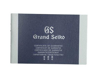 Lot 636 - GRAND SEIKO - A Heritage GMT Quartz Watch 50th Anniversary stainless steel gentleman's bracelet wristwatch.