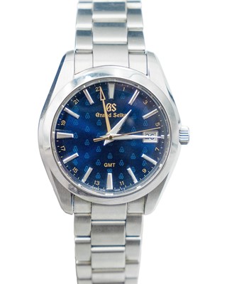 Lot 636 - GRAND SEIKO - A Heritage GMT Quartz Watch 50th Anniversary stainless steel gentleman's bracelet wristwatch.