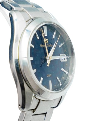 Lot 636 - GRAND SEIKO - A Heritage GMT Quartz Watch 50th Anniversary stainless steel gentleman's bracelet wristwatch.