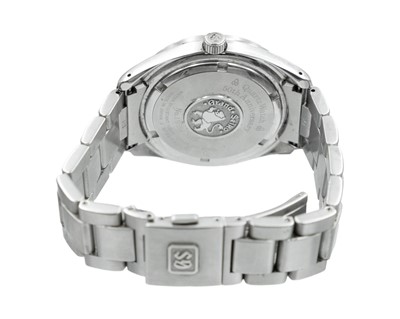 Lot 636 - GRAND SEIKO - A Heritage GMT Quartz Watch 50th Anniversary stainless steel gentleman's bracelet wristwatch.