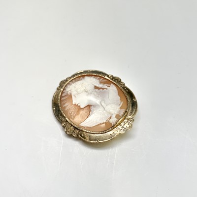 Lot 2420 - A chased gold-mounted cameo brooch