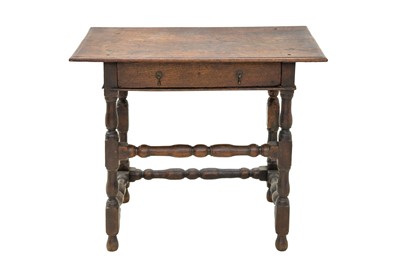 Lot 687 - A 17th century oak side table.