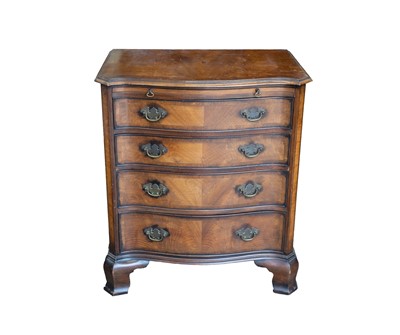 Lot 807 - A walnut and crossbanded chest.