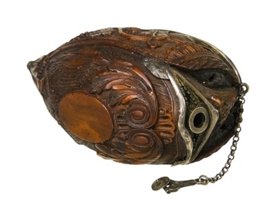 Lot 741 - A charming coquilla nut bugbear snuff box.