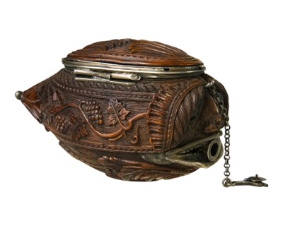 Lot 741 - A charming coquilla nut bugbear snuff box.