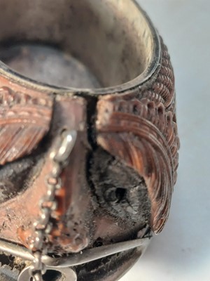 Lot 741 - A charming coquilla nut bugbear snuff box.