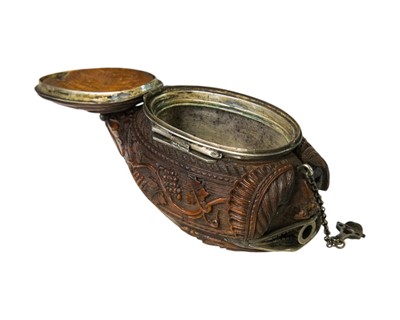 Lot 741 - A charming coquilla nut bugbear snuff box.