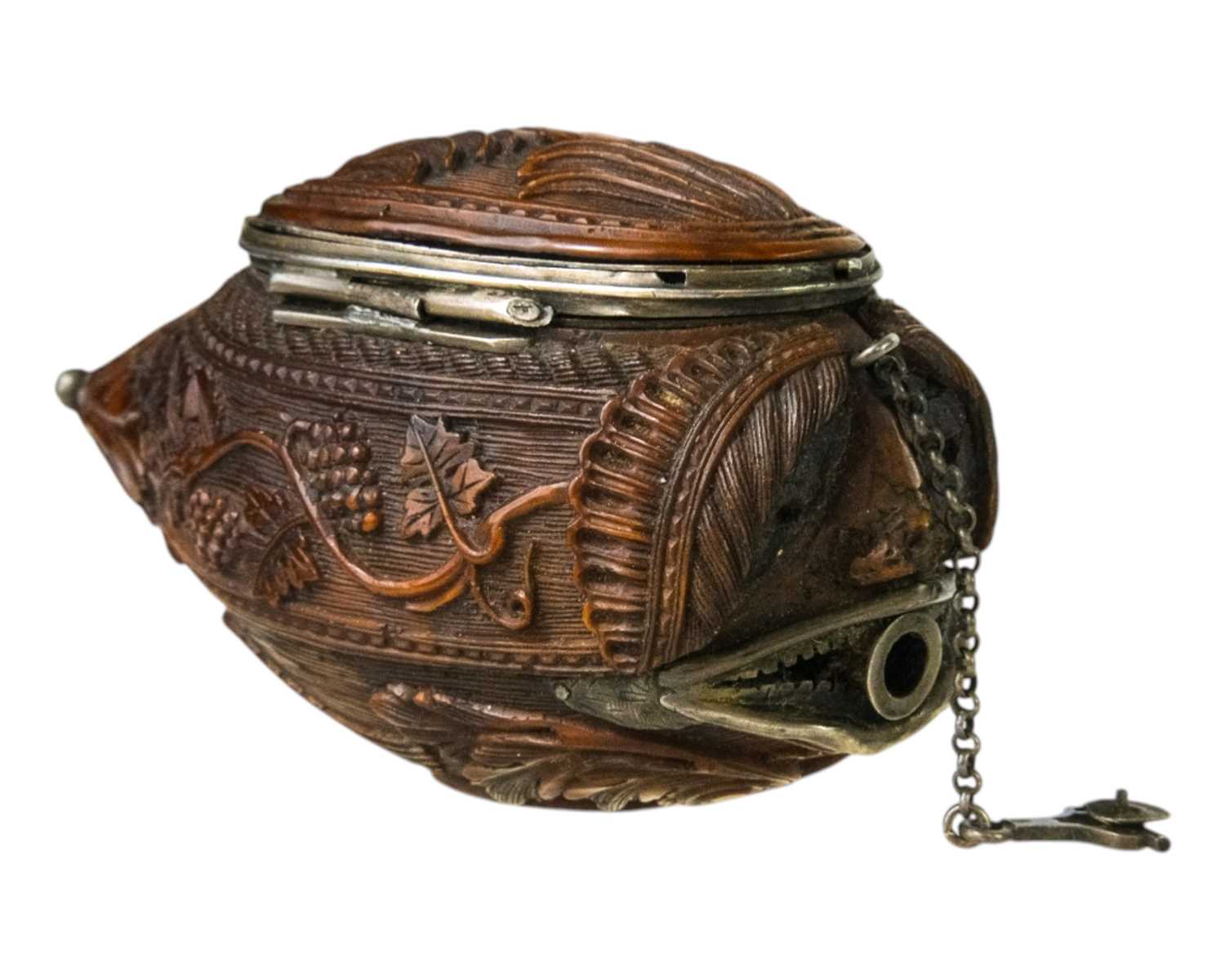 Lot 741 - A charming coquilla nut bugbear snuff box.